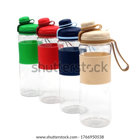 Set of color bottles for sport isolated. Plastic bottles for fitness on a white background.
