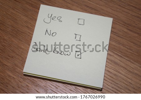 Yes No don’t know written on post-it note shows person has no clue has a poor understanding and cannot answer the question
 Royalty-Free Stock Photo #1767026990