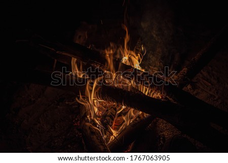 COLORFULL SCENE FROM WOOD ON FIRE, ABSTRACT BACKGROUND
