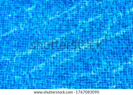 water surface below the pool floor,Blue tile background texture Royalty-Free Stock Photo #1767083090