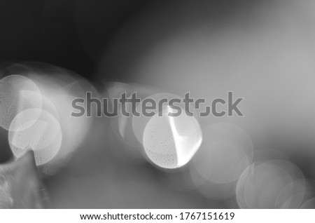 Monochrome background with a beautiful bokeh. Abstraction.