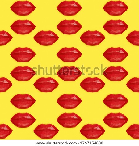 Seamless pattern with bright beauty red polygonal paper lips on yellow background.