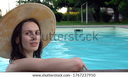 Woman at the pool. Summer holidays.