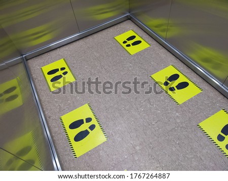 footsteps in the elevator to keep your distance