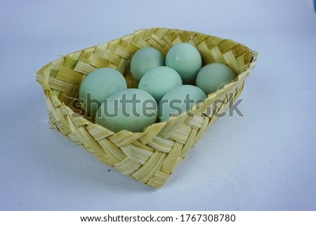 duck eggs in bamboo (woven) containers