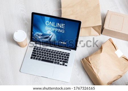 online shopping or internet shop concepts, with a laptop