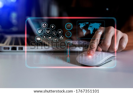 Double exposure of businesswoman working on digital laptop with digital marketing virtual chart, Abstract icon, Business strategy concept, Background toned image blurred.