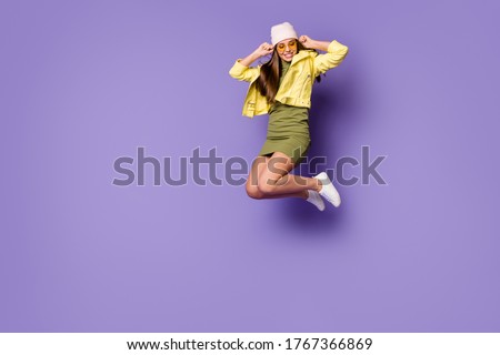 Full length body size view of her she nice attractive pretty fashionable cheerful girl jumping having fun enjoying leisure isolated over bright vivid shine vibrant lilac purple violet color background