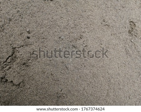 Grey natural sand background. For your creativity.