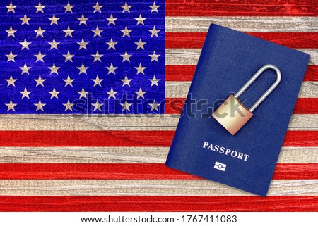 Passport and padlock on the background of the us flag