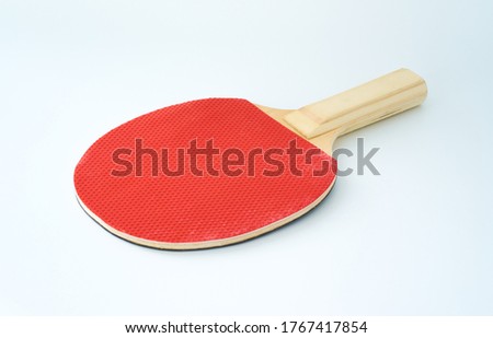 Ping Pong paddle isolated on a white background