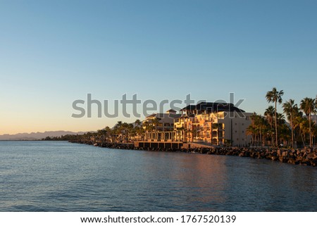 View of Loreto boardwalk and bay area at sunrise Royalty-Free Stock Photo #1767520139