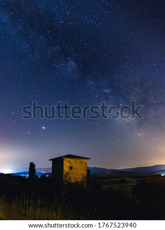 Milky Way over an old palace in the middle of the night