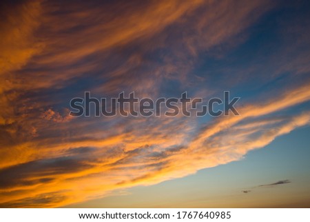 Yellow clouds in the sunset sky 