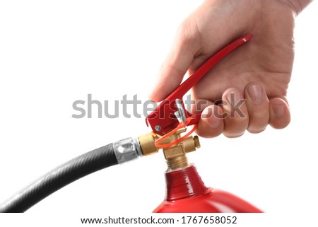 Man using fire extinguisher on white background, closeup