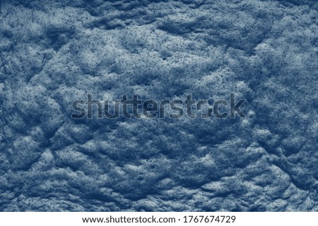 Abstract blue background. Light blue background resembling the texture of the sea.