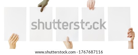 mixed group with hands holding blank paper isolated