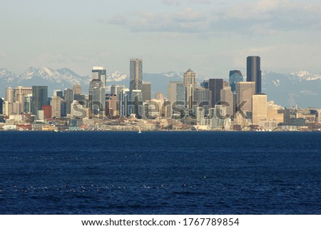 Seattle coastline with mountains in background