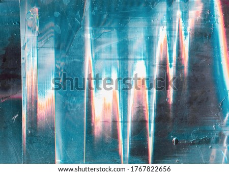 Glitch abstract background. Digital distortion. Blue white orange noise on scratched wet screen.