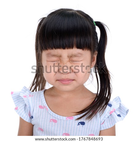 Asian little girl close her eye isolated on white background