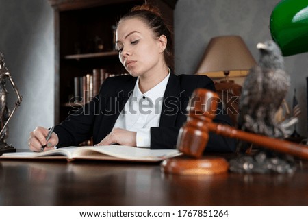 Law firm concept. Lawyer works out an agreement.