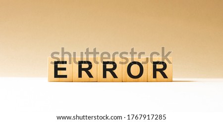 Word error made with wood building blocks