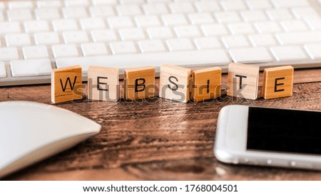 Letters on wooden pieces concept, business background, english word : website