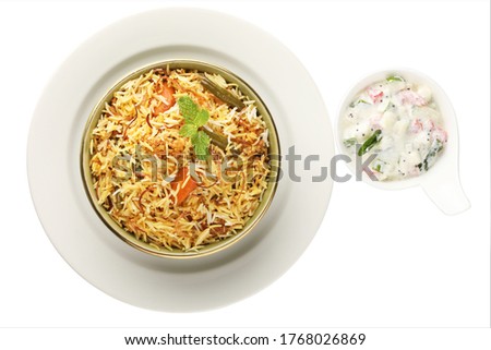 Vegetable Biryani a flavorful Indian rice dish with peas, carrots and potatoes with spicy spices. selective focus