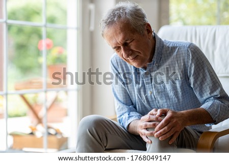 Senior man with knee pain
 Royalty-Free Stock Photo #1768049147