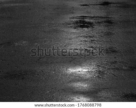 wet asphalt road after rain Royalty-Free Stock Photo #1768088798