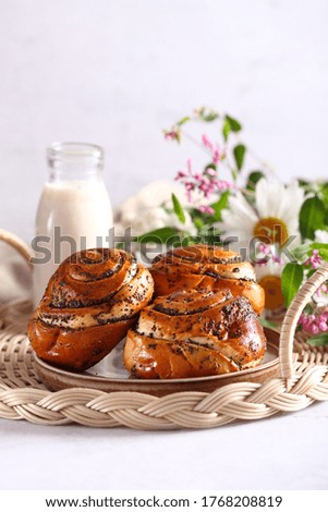 sweet roll poppy seed buns with milk