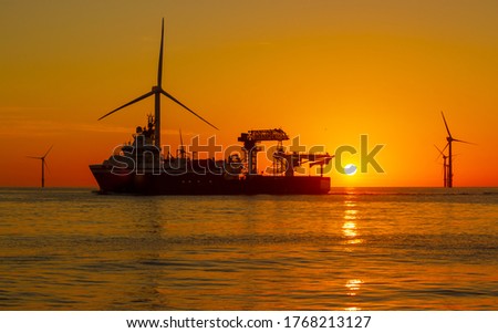 Beautiful sunset in the North Sea Royalty-Free Stock Photo #1768213127
