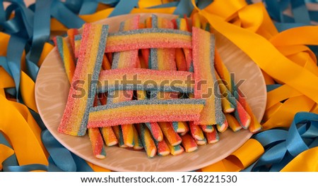 Different types of candy that give a beautiful color to the image.