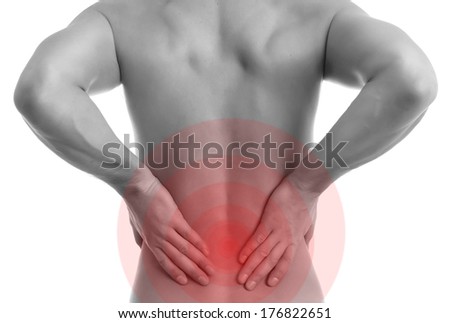 Man touching back of spine.Pain concept.Isolated on white