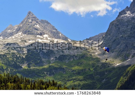 Paraglider with mountain view in Lofer austria