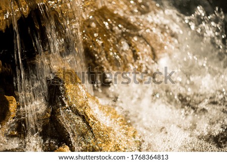 A small waterfall on a mountain river