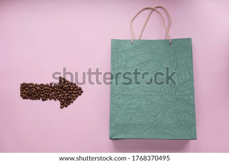 arrow with coffee points to shopping bag. Shopping concept