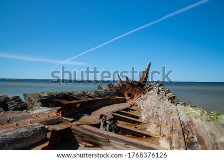 Ship wreck of Reketa. Wooden vessel rottening near Loksa in Estonia. Broken old boat photos. Drone images. Rusty and broken old vessel. Sunk ship in Baltic sea. Pictures taken on the beach