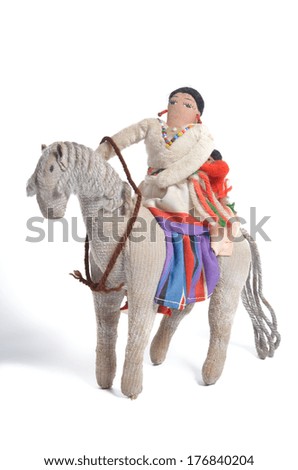 Vintage Navajo doll. Woman and kid on horse.