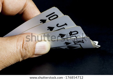 playing cards on black background