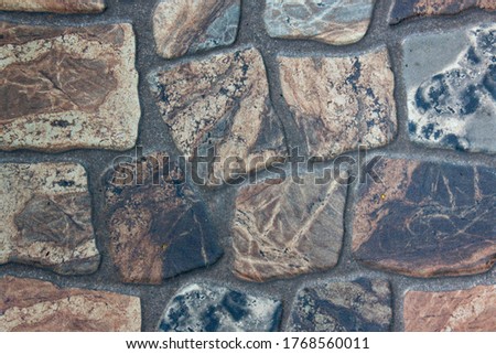 Stone floors, walls of polished stone for the background. Textured background illustration. Abstract multi-color granite texture for exterior and interior interiors. Architectural Wallpaper