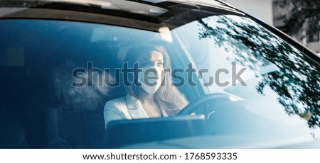 Business woman is using car transportation to social distancing during pandemic