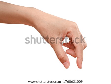 Close up hand holding something like a bottle or can isolated on white background with clipping path. Royalty-Free Stock Photo #1768631009