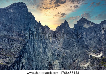 Famous tourist spot The Troll Wall (Trollveggen) - a section of the Trolltinden massif, located on the west coast of Norway in the Romsdalen Valley, Reinheim National Park.
 Royalty-Free Stock Photo #1768653158