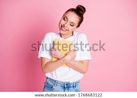 Photo of cheerful girl hug embrace favorite book enjoy wear style stylish trendy clothes isolated over pastel color background Royalty-Free Stock Photo #1768683122