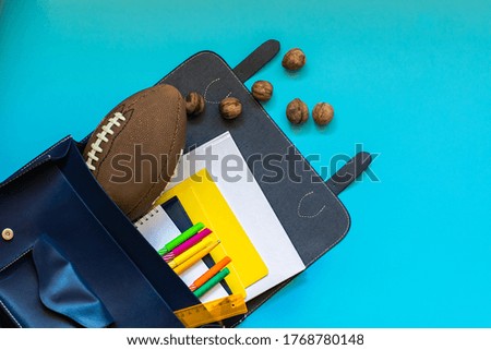 School supplies on the blue background with copy space. Back to school.