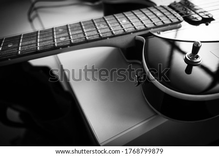 Guitar and equipment in the music practice room.