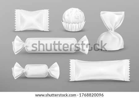 White polyethylene package for candies, chocolate, lollipops, truffle, food snacks and pouch sweets production. Vector mockup set of candy wrappers for brand ad design isolated on grey background. Royalty-Free Stock Photo #1768820096