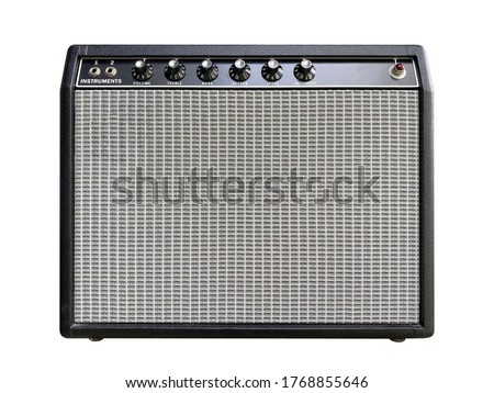 Isolated boutique black leather vintage electric guitar amplifier with a black knob on white background with clipping path. Popular amp in rock, blues music. front view photo. Royalty-Free Stock Photo #1768855646