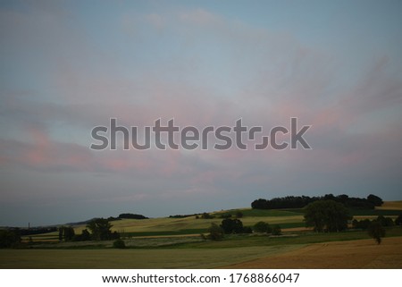 grain fields during harvest time in the Eifel blur